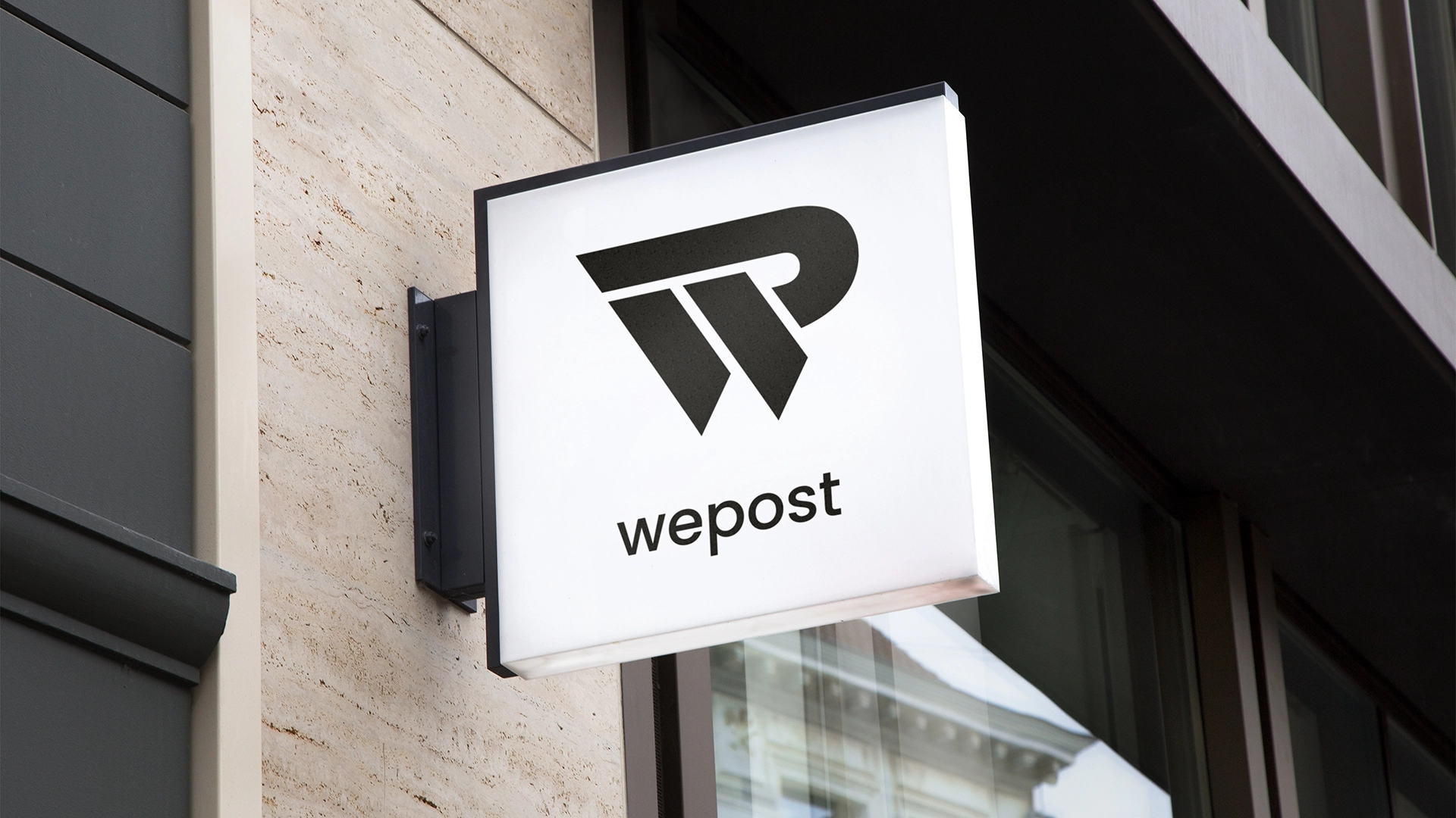 WEPOST exterior signage — illuminated box sign on building facade
